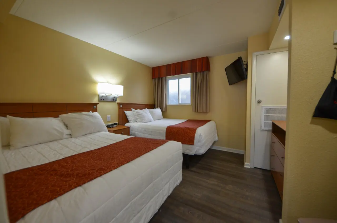 Two beds in the separate bedroom of a Type E suite